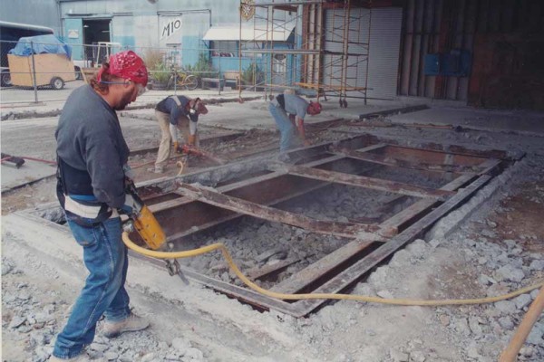 The open-air truck scale being demolished in 2002. Photo courtesy of Mark and Kelly Sanchez.