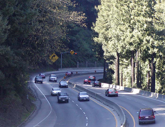 Tight curves like this one, just north of Summit Road overpass, cause most accidents on Highway 17. In 2010 almost 90% of all accidents on 17 occurred at the notorious Laurel Curve. Photo courtesy of Stan Shebs. (March 2004)