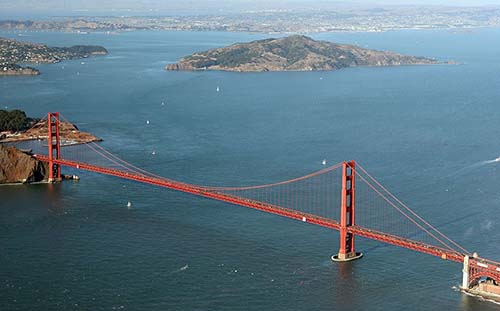 Touch-ups on the Golden Gate Bridge require 5,000 to 10,000 gallons of International Orange paint every year. Photo courtesy of Anita Dikinme. (Dec 19, 2005)