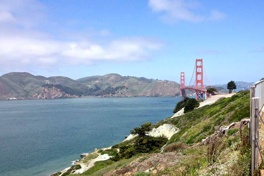International Orange, the color chosen for the Golden Gate Bridge, is a perfect complement to the warm tones of the surrounding hills of Marin. Photo courtesy of Molly Lautamo.