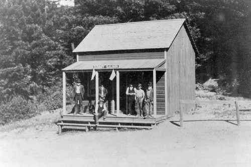 A group of summit area ranchers celebrate the Fourth of July at the Summit Saloon, 1906. Photo courtesy of Jimmy Rapley.