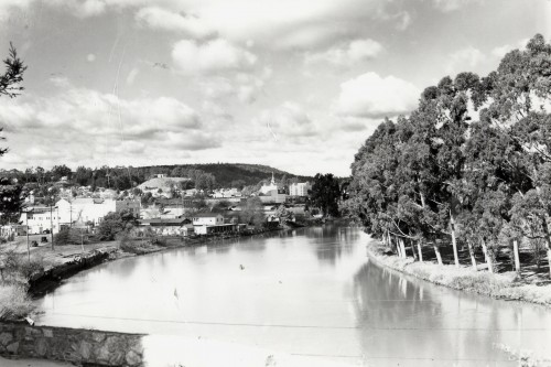 Imagine the San Lorenzo River surging during a winter storm and you can see the danger of living within a river’s floodplain. Photo courtesy and © of Santa Cruz Museum of Art and History.