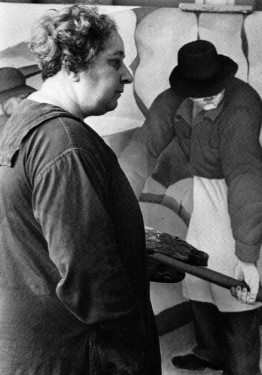 Henrietta Shore painting “Limestone Quarries Industry” in her Carmel, California studio, 1936-1937. This photograph is on display in the lobby of the Santa Cruz post office.  (Photo: Monterey Museum of Art collection, photographer unknown)