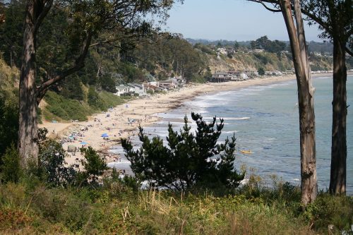 The fishing village at New Brighton State Beach was located where the public restrooms are today - just behind the Eucalyptus tree in the above present-day photo. Richard Masoned 2012, CC BY-SA 2.0